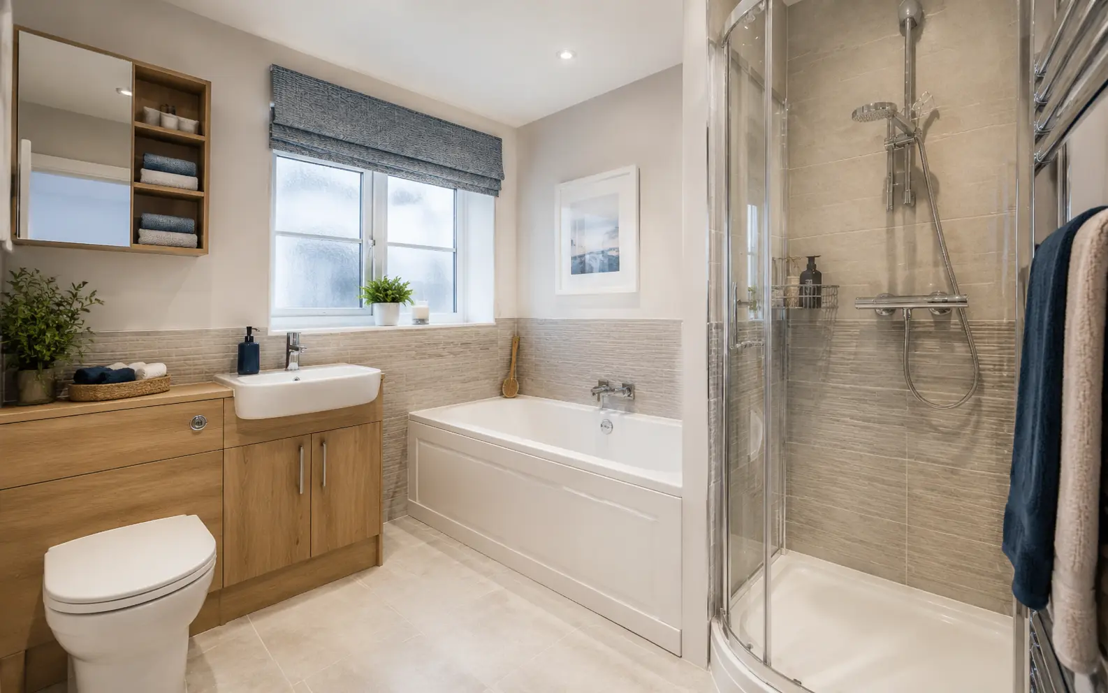Well-planned British family bathroom with a bath and separate shower